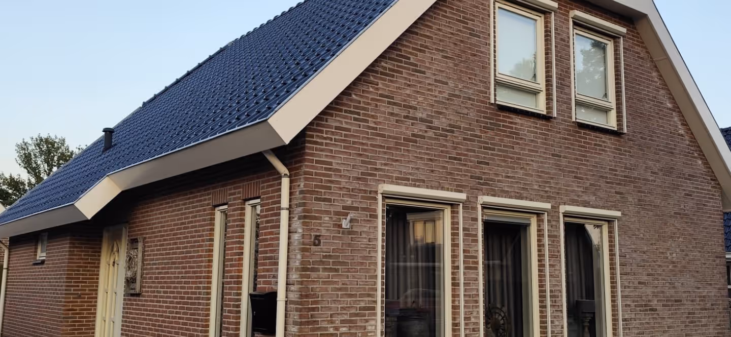 Achtergrond afbeelding van een huis met GoEco kozijnen